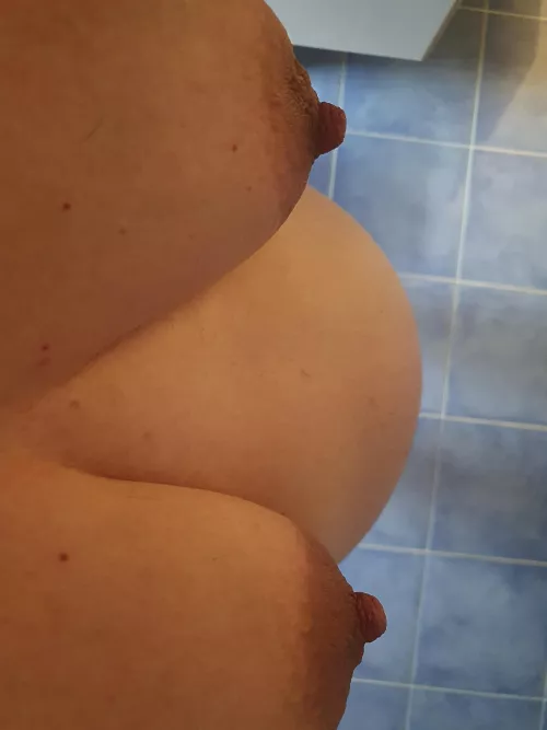 Is that you I can feel licking on my pussy? I can't see anything with my belly