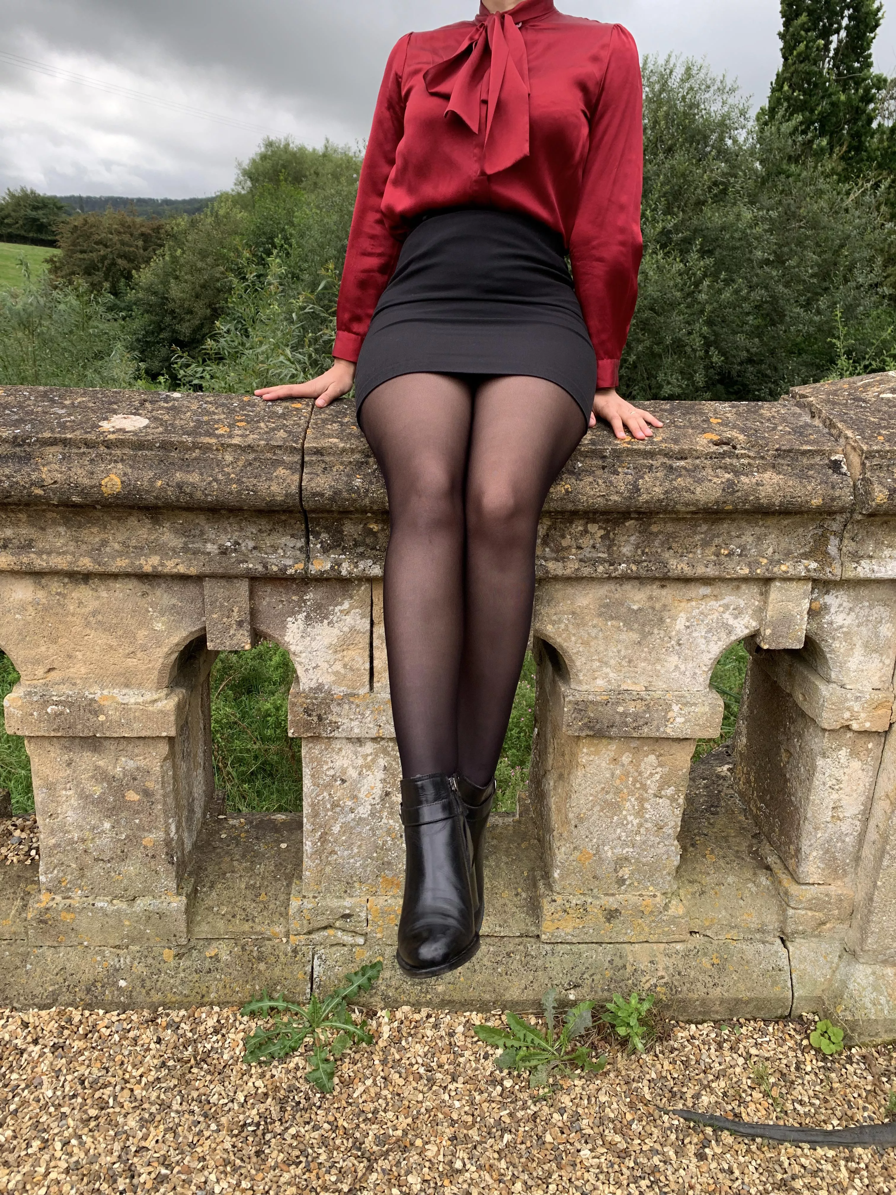 Office trouble: A silk red shirt and a pencil skirt. Where does it rank on the classy scale?