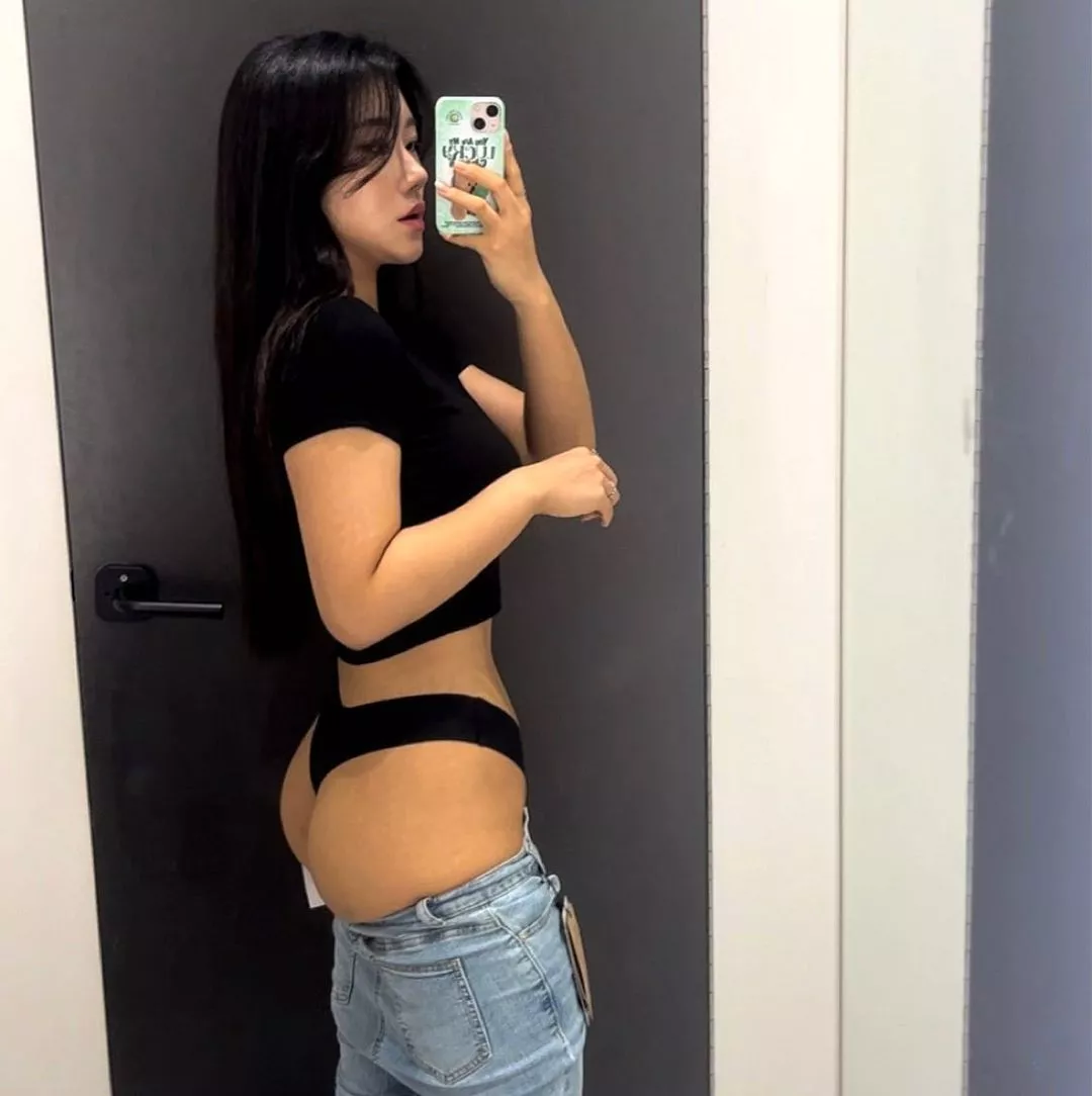 Showing off ass in thong