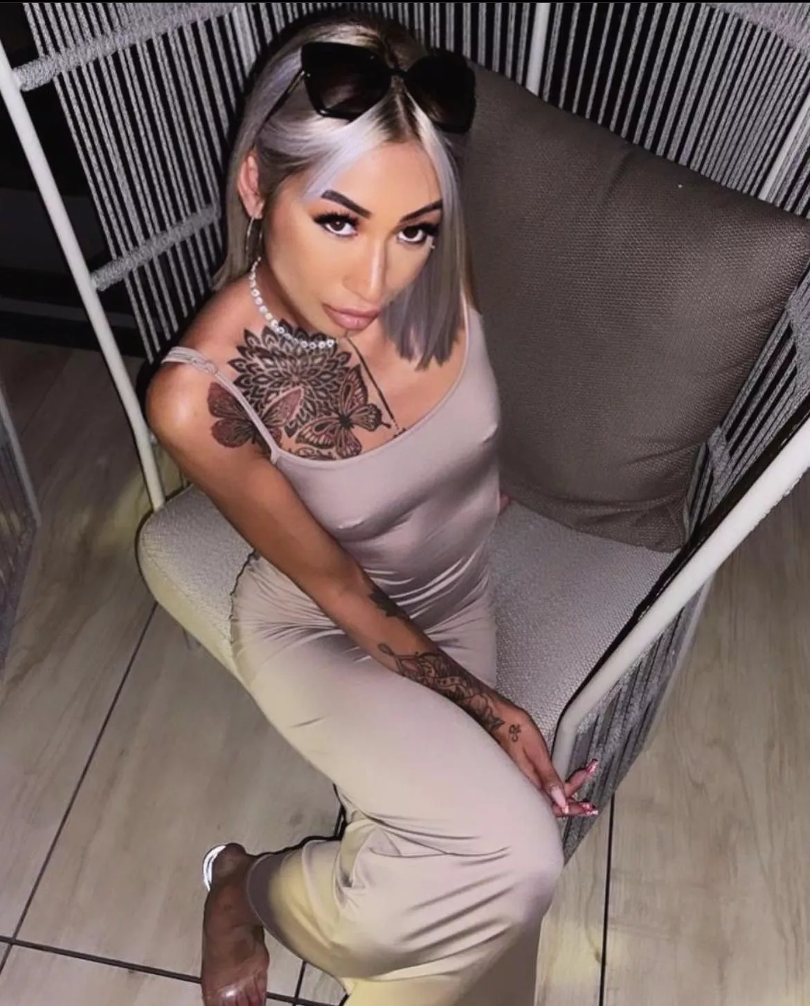 this dress is so tight you can see the piercings