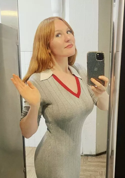 Busty redhead