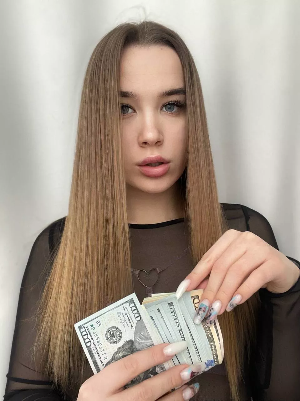 I like to count money with my hands with long nails