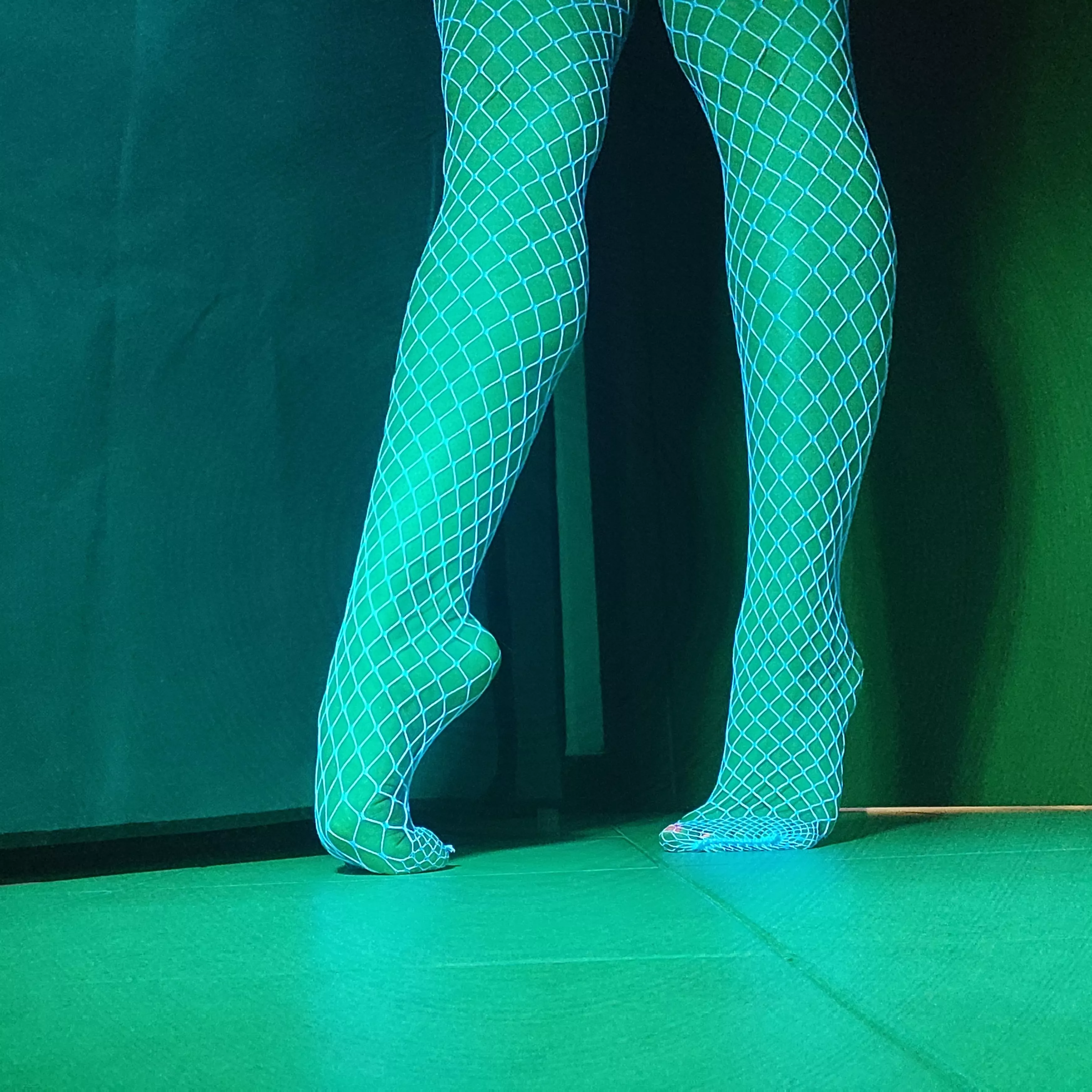 Would you worship my legs and feet under this UV light? 😏