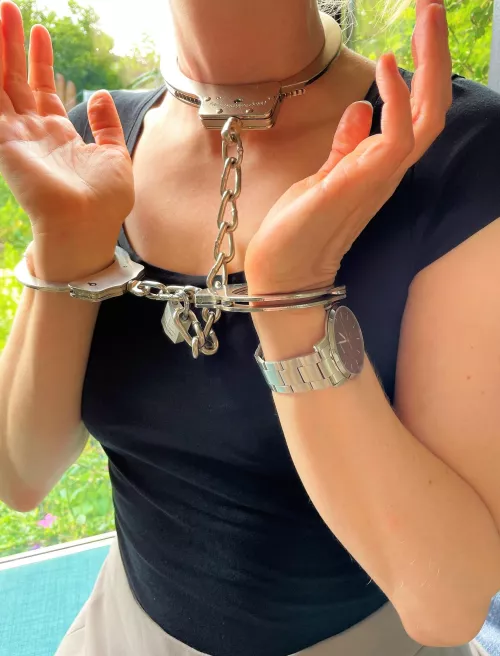 Wearing my handcuffs AND a neckcuff!