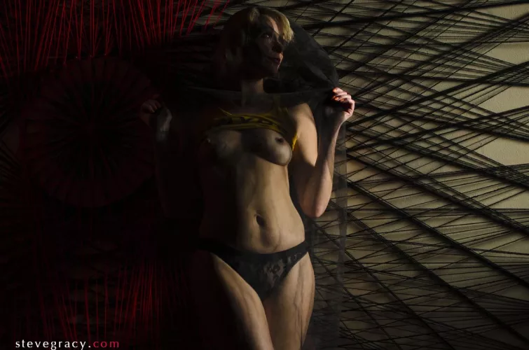 Becca on the string art wall