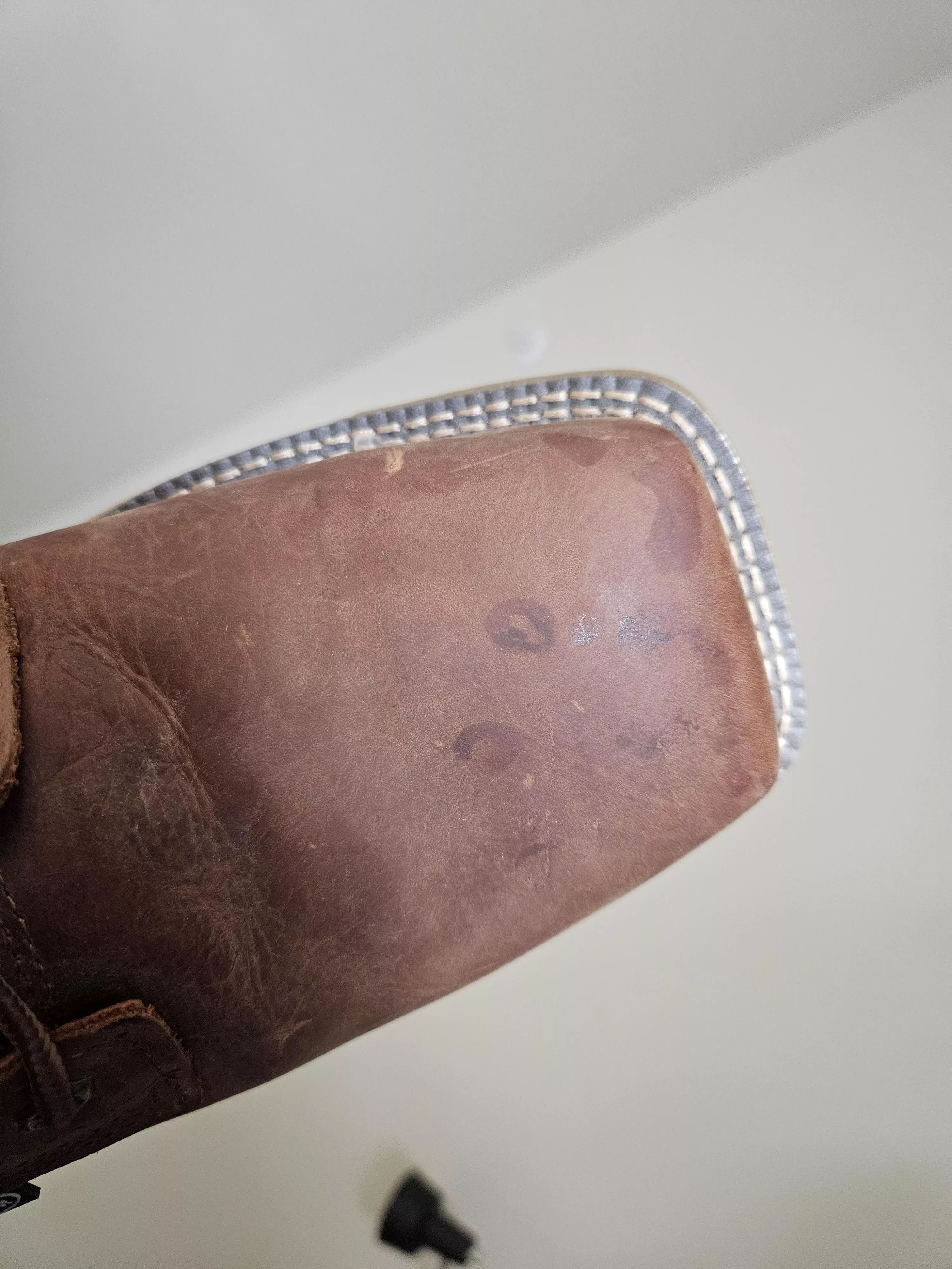 First pair of boots, what are these dark stains?