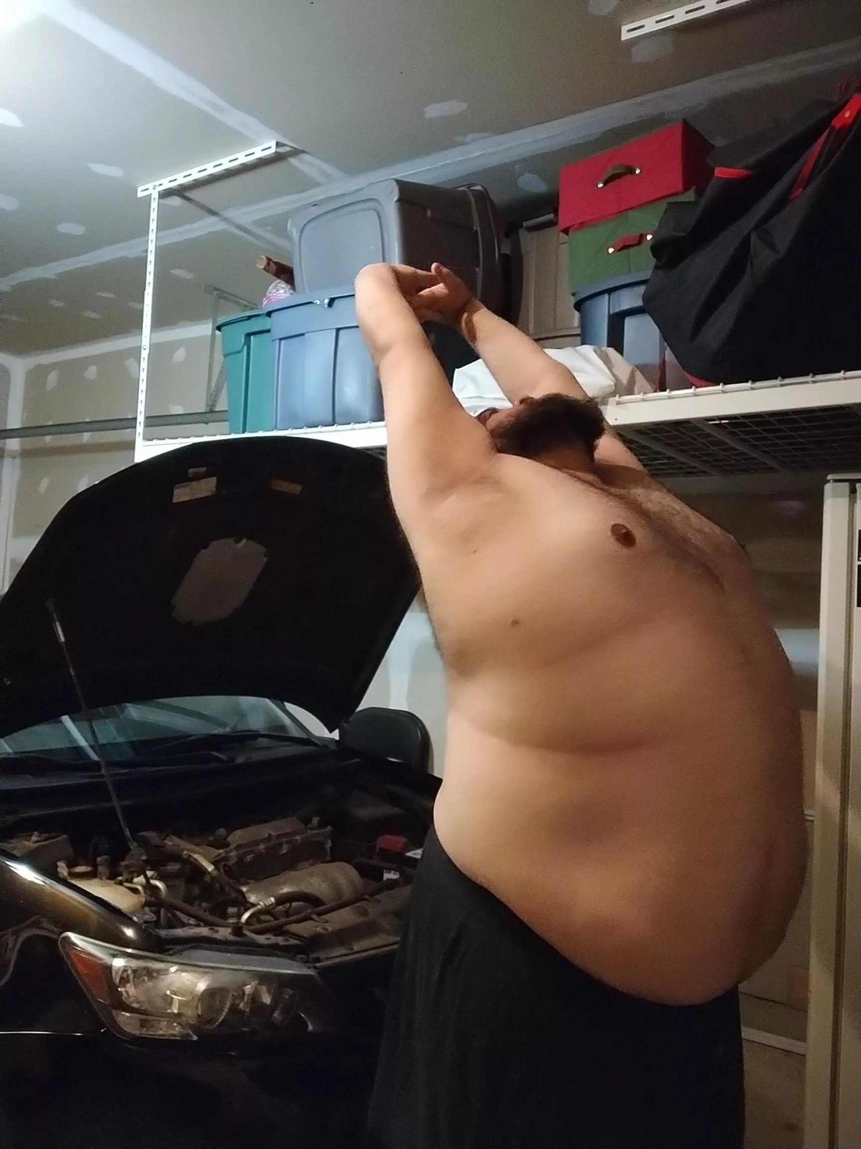 Stretching out before changing these spark plugs