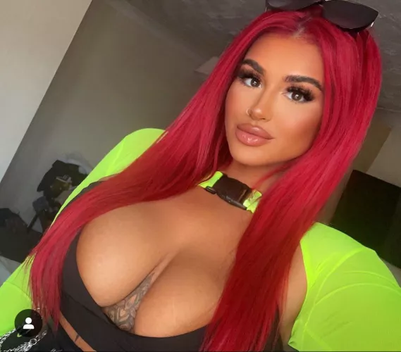 Busty Redhead Bimbo