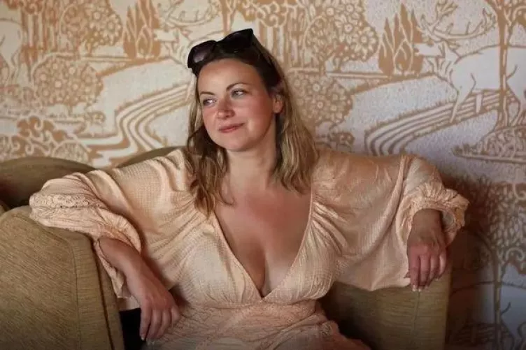 Plunging neckline curvy blonde