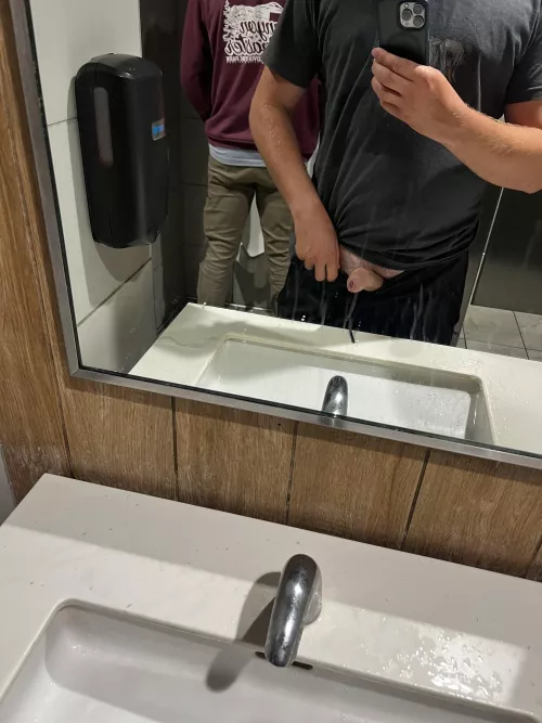 Pulling dick out with someone behind me at the urinal