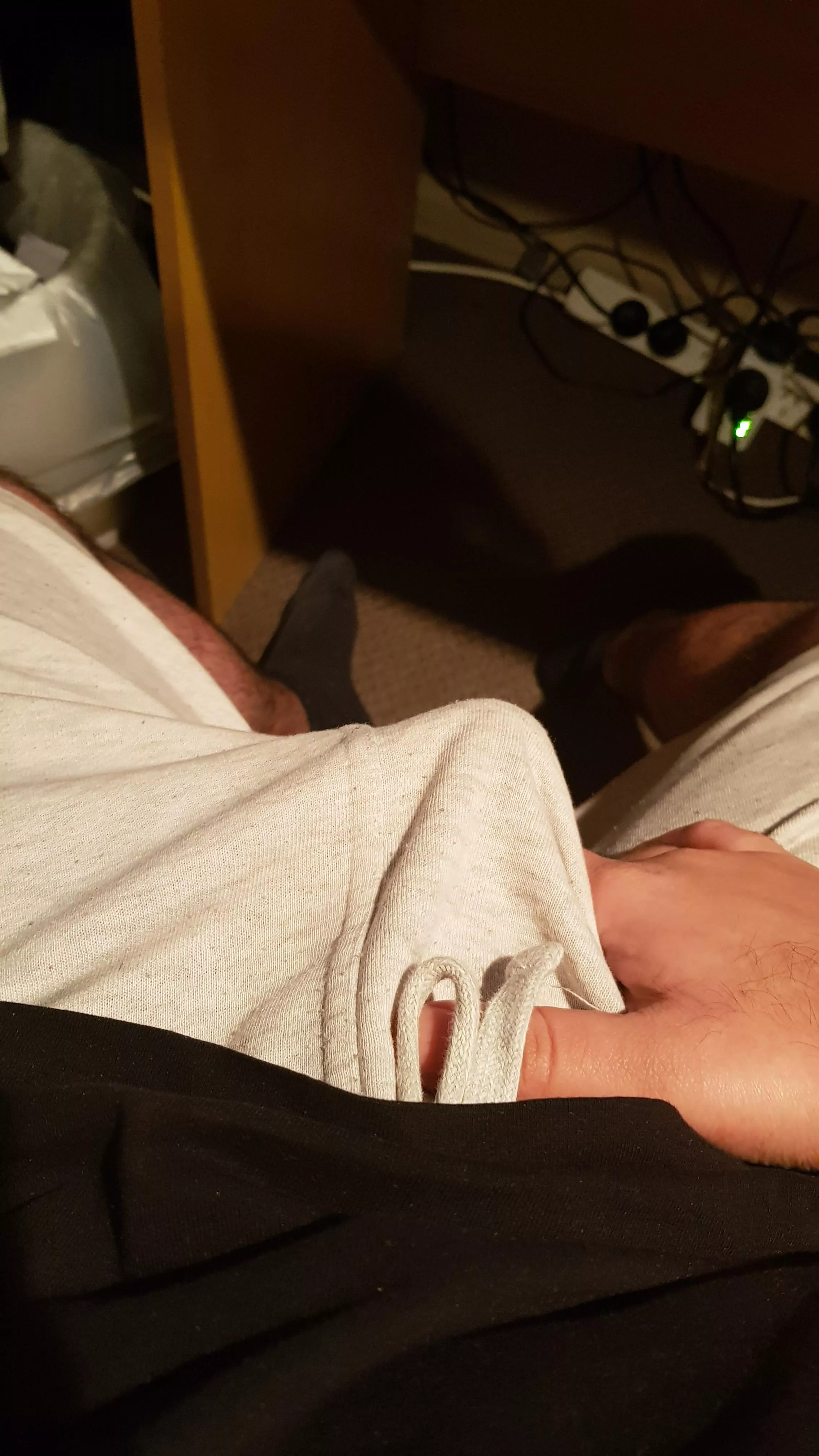 Bulge hiding under shorts