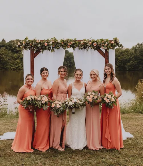 The bride or one of the bridesmaids??