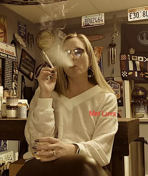 A sweater, wine, Leather Pants, and a VS120...Only one thing missing from a Cougar's dream....