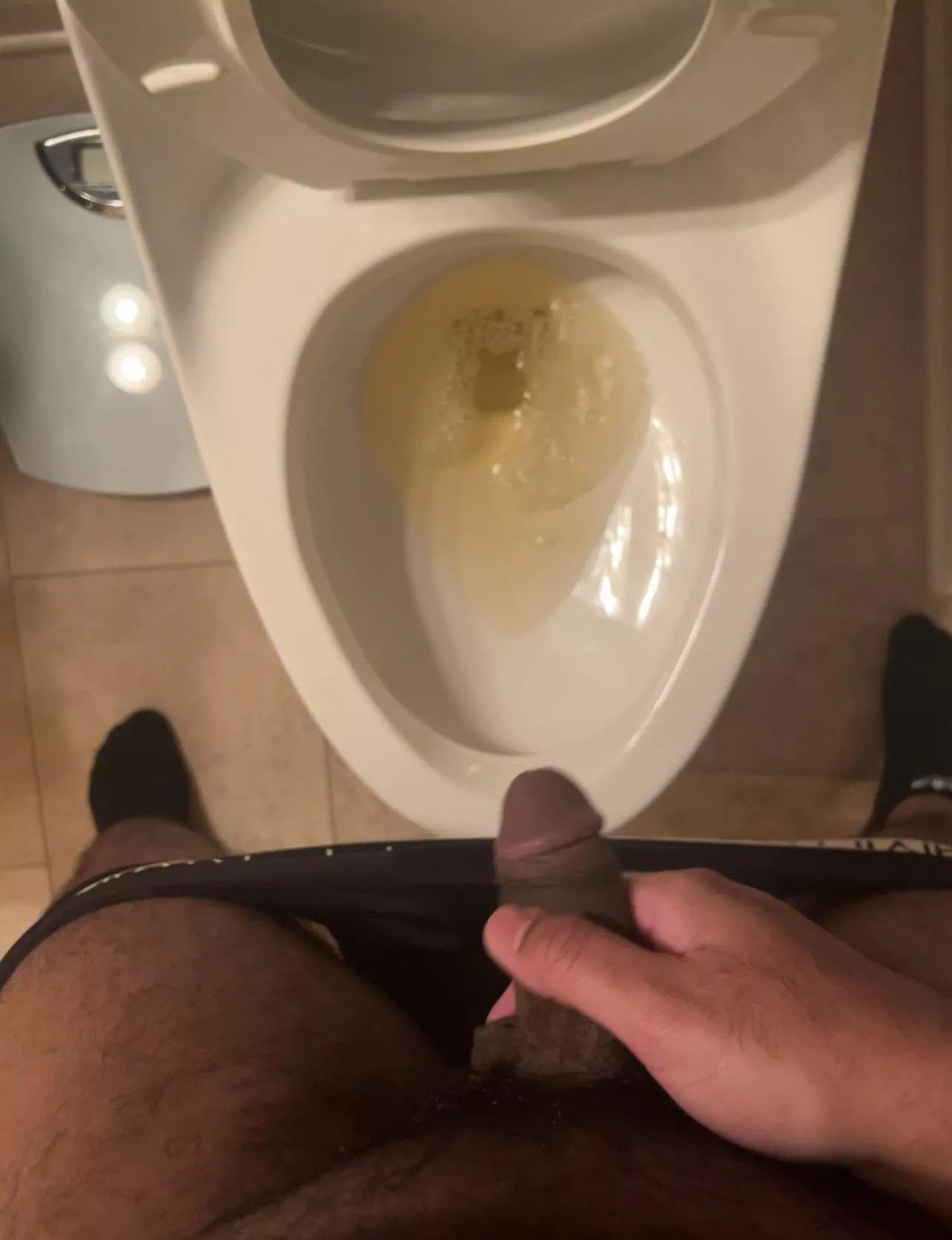Brown dick with some yellow piss