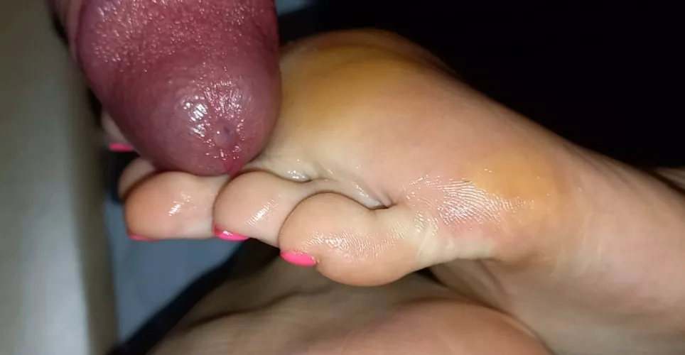 Rubbing the frenulum with her toes