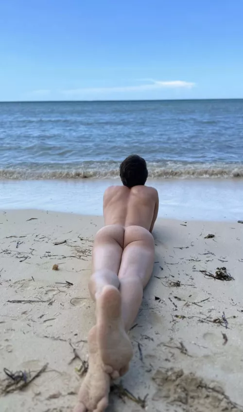 Sun bathing at the beach