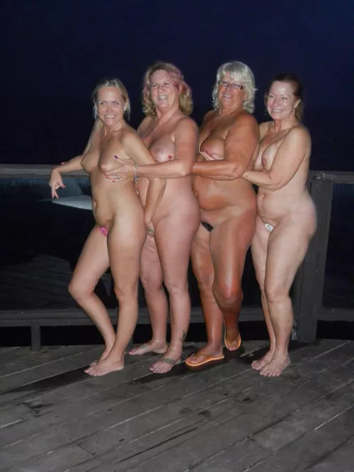 Topless GILFs in C-string two-piece bottoms