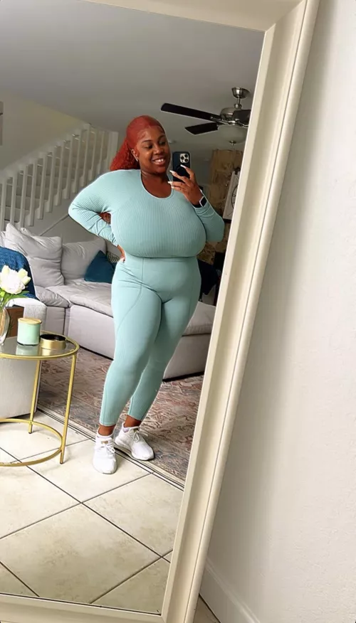 A big smile with even bigger tits!