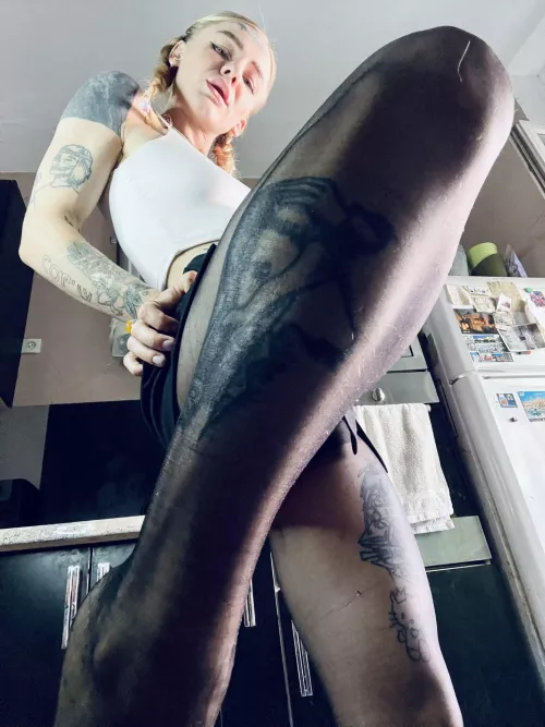 Sultry tattooed enchantress