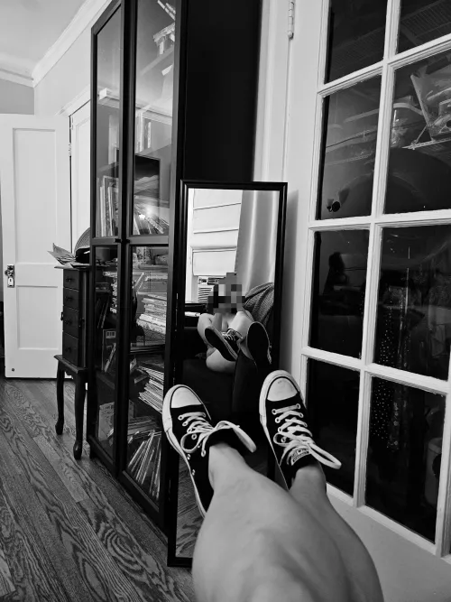 Wearing my chucks in my watching chair