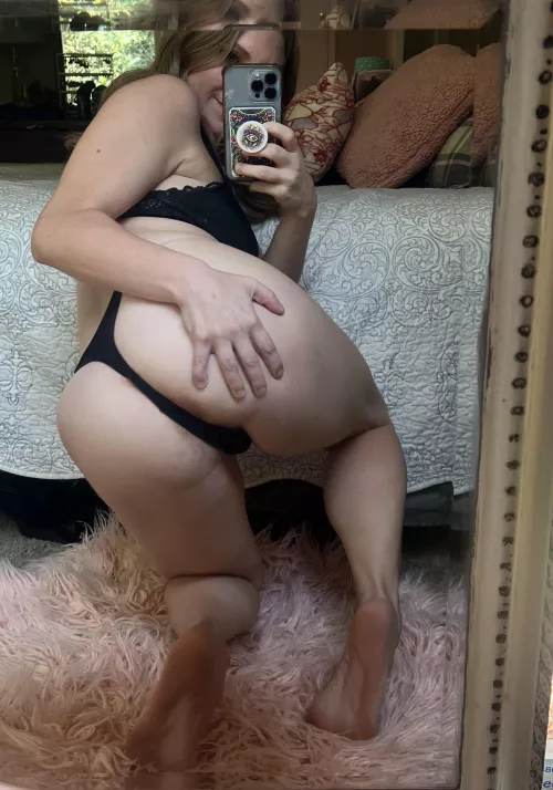 My hole looks sexy next to this black thong