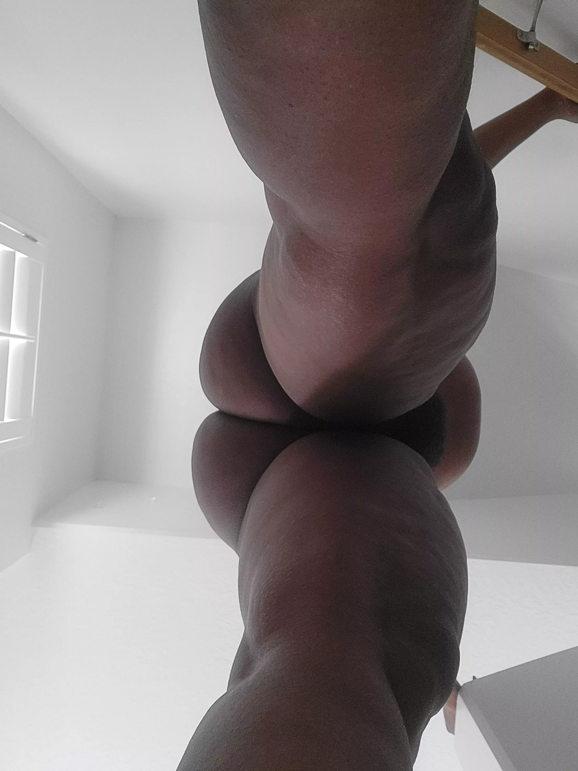 A little insecure about this one but here it is. Under view of my booty and pregnant belly