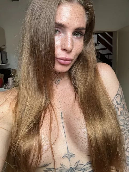 No makeup and no clothes showing off my freckles