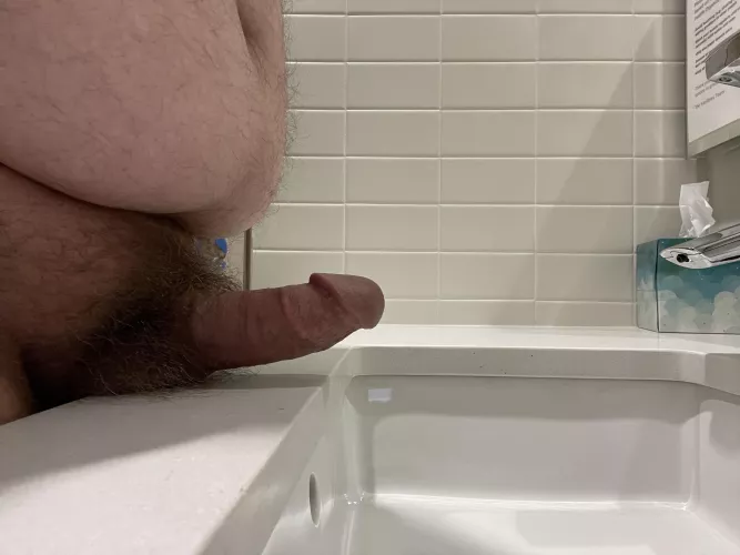 Waiting in the bathroom.