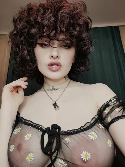 Put your hand under your blouse