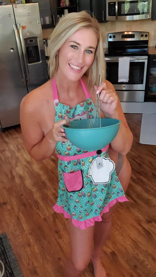 Wearing nothing but an apron...