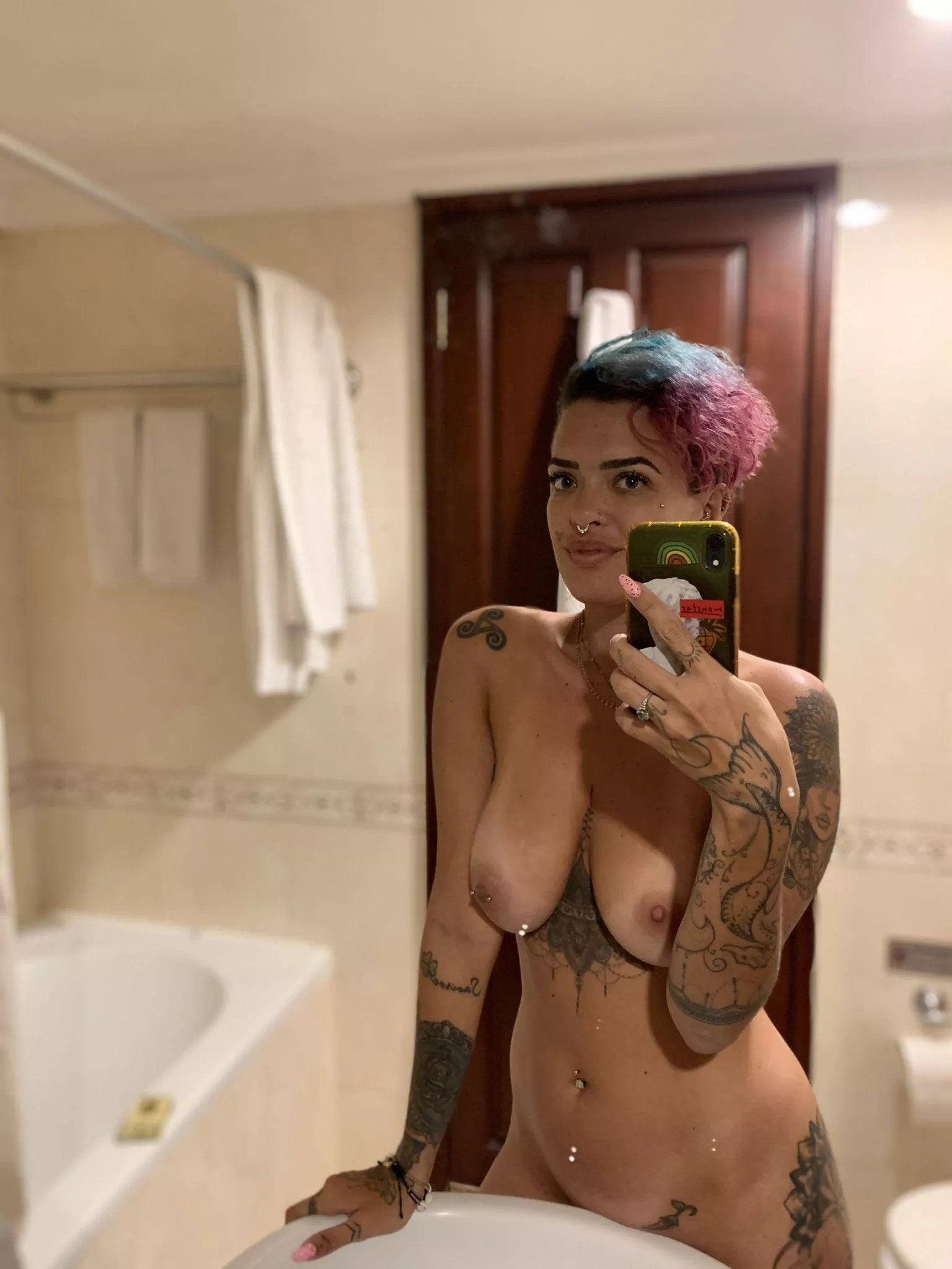 Do you like my rainbow hair or tits more??