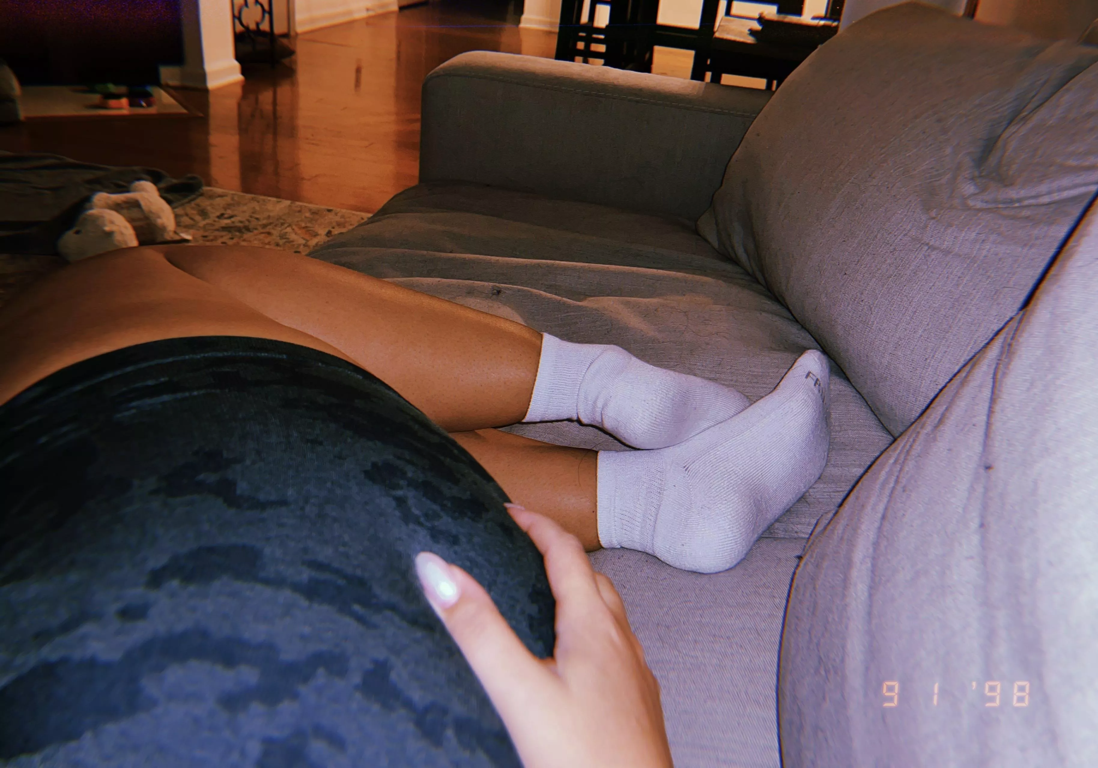 Lay with me and massage my socked feet