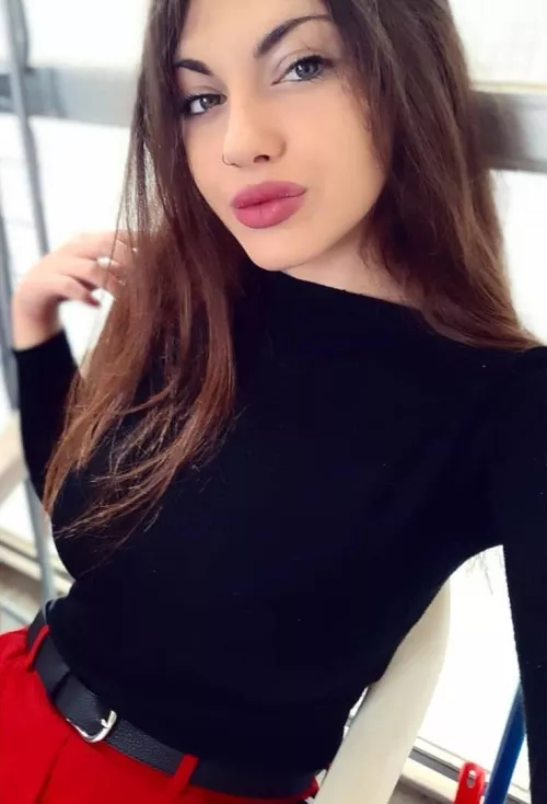 That shirt can almost hide her MASSIVE rack