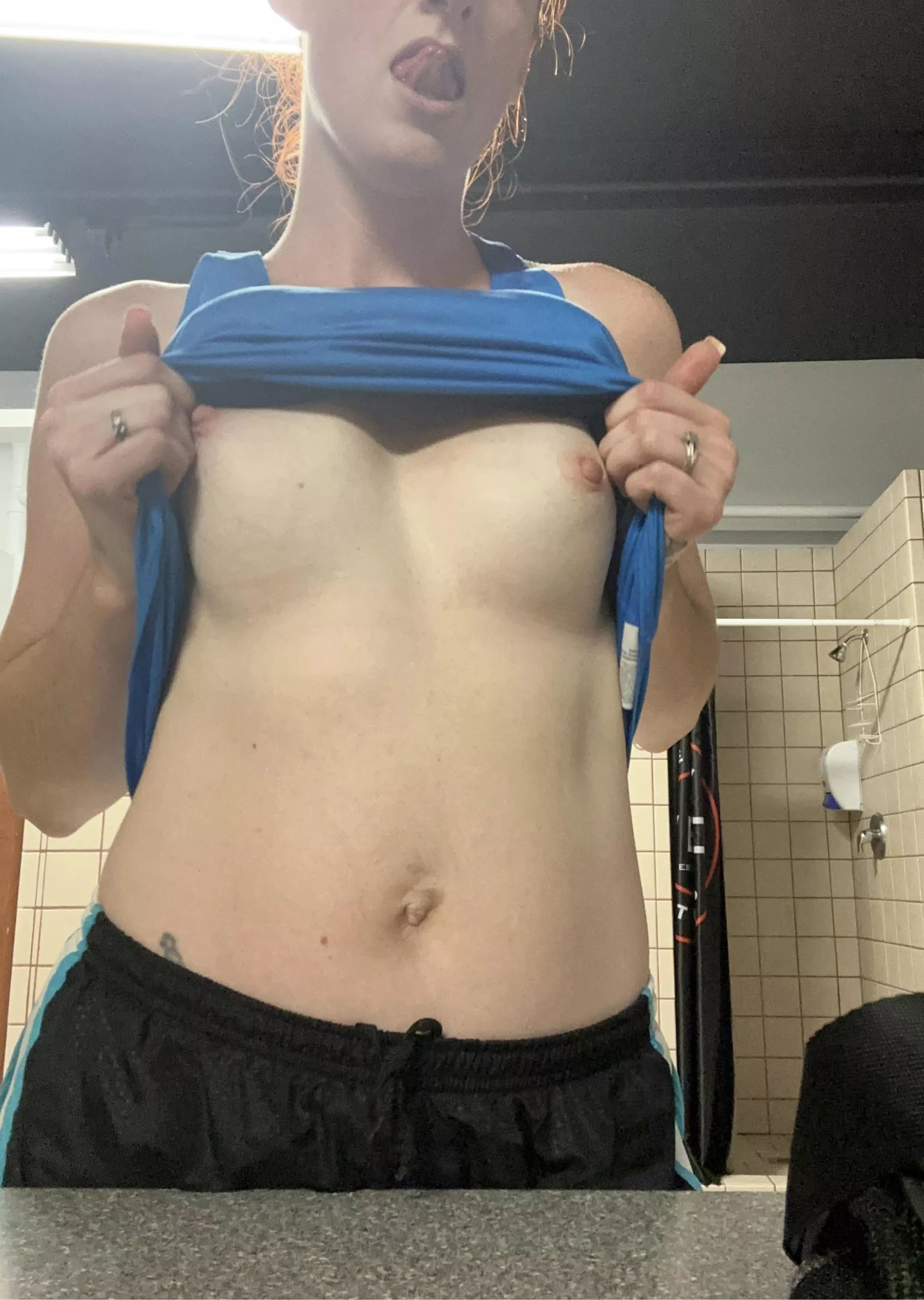 The universities gym is a great place to flash my tits …
