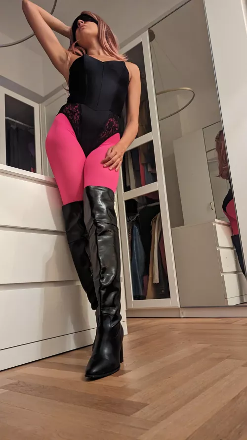 black bodysuit and pink pantyhose