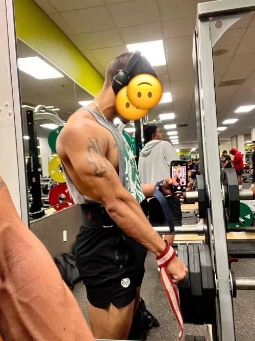 Checking my arms out in the mirror