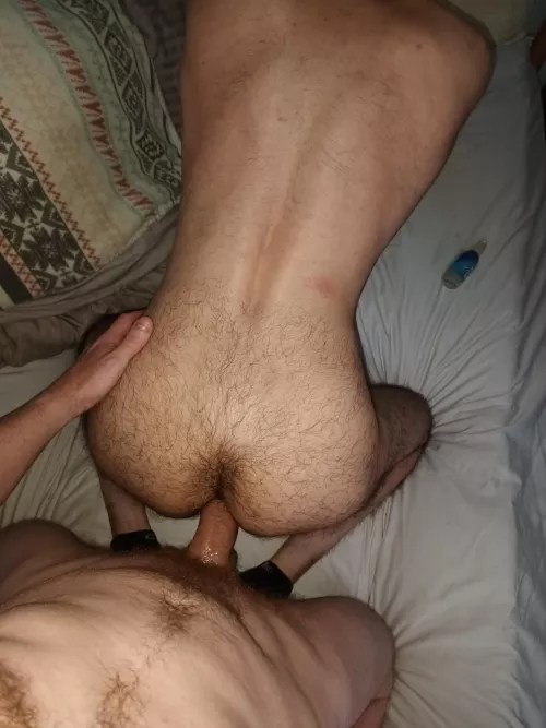 Burying another load in him