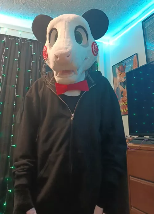 I dressed my fursuit up to look like Billy the puppet from Saw for Halloween :)