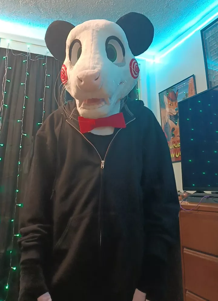 I dressed my fursuit up to look like Billy the puppet from Saw for Halloween :)