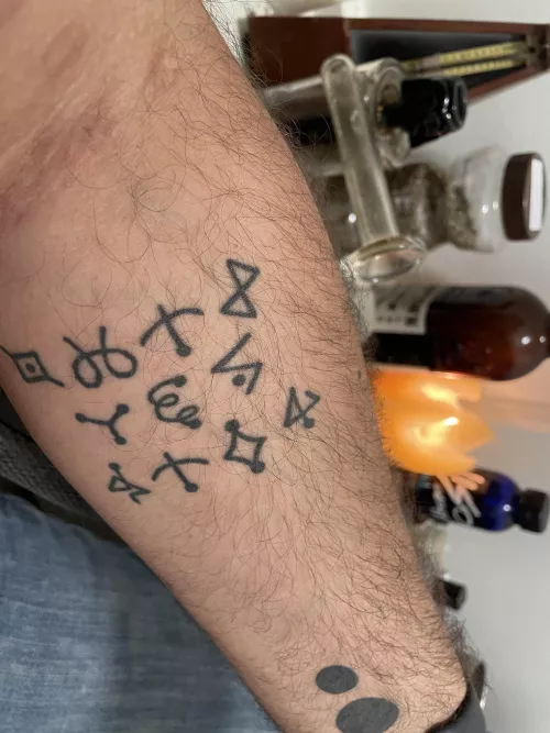 My left with tattoos