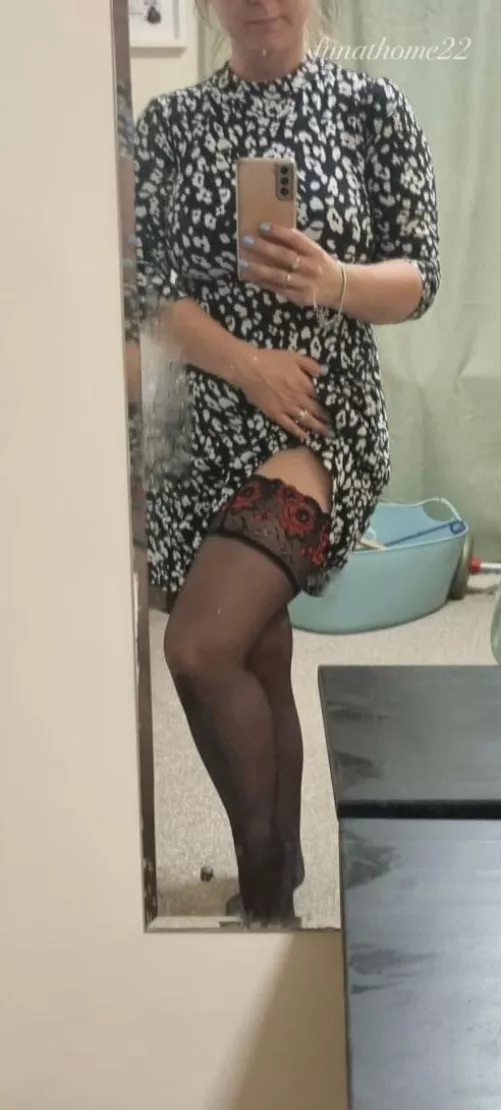 Dress is just short enough that the stocking tops don’t stay hidden