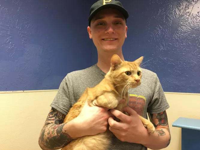 A three legged cat named Rusty and I.