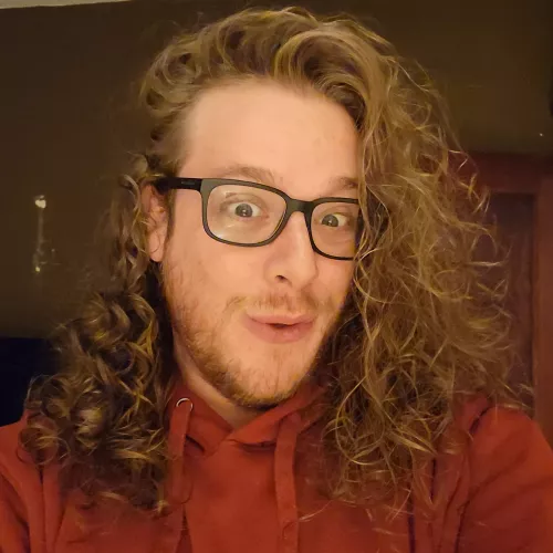 My reaction to my hair being so curly, caught in a picture.