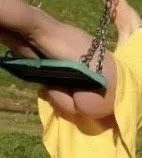 My wife at the park swings