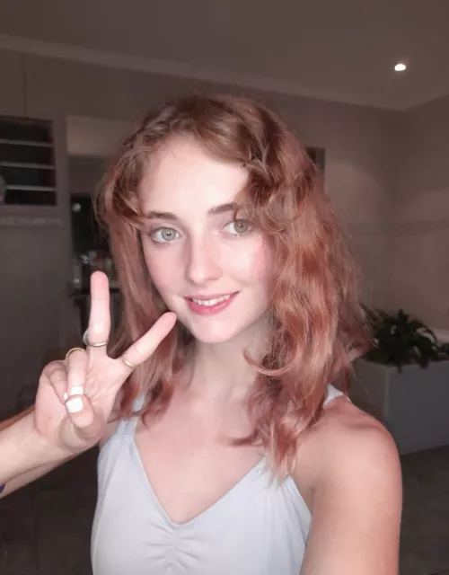 Sometimes, a sultry smile can be more alluring than revealing clothing F18