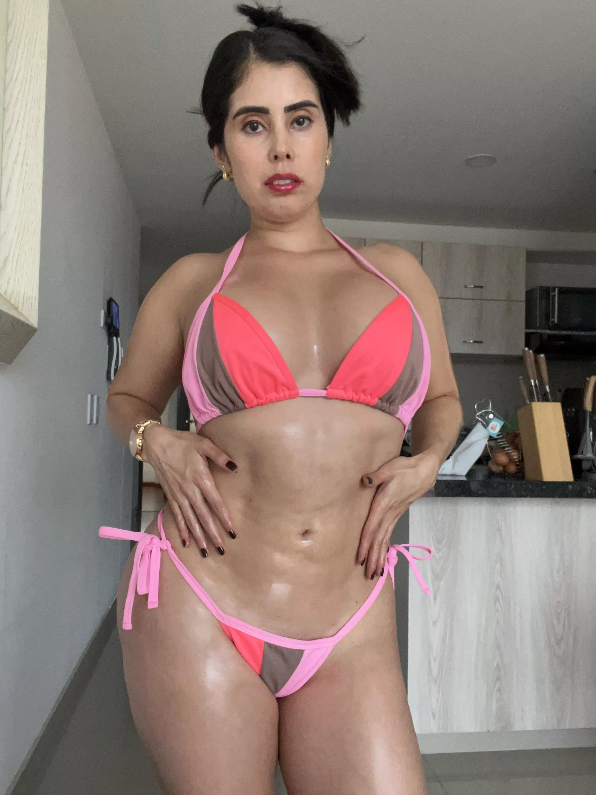 42 and rocking my bikini