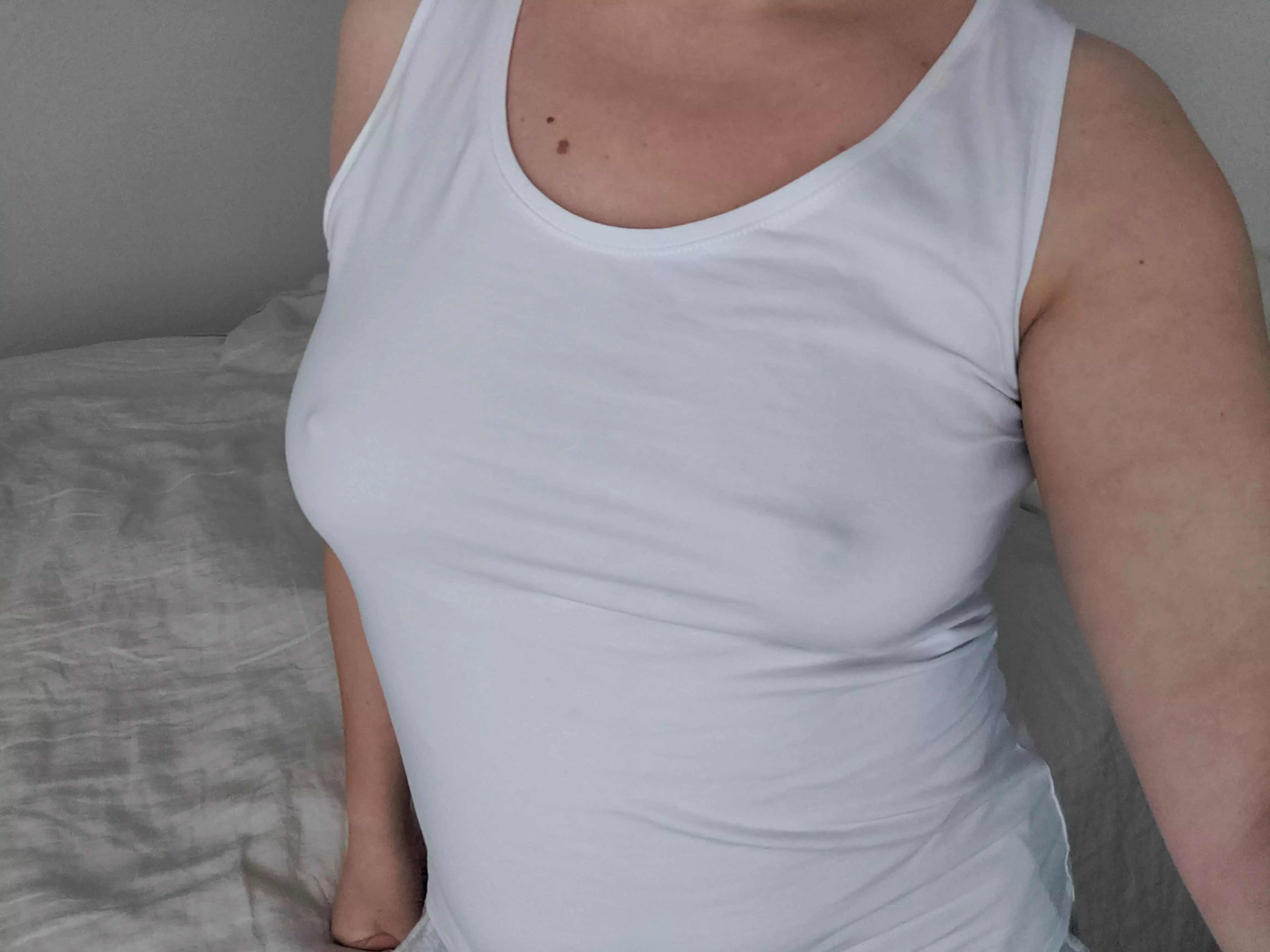 I love white tank tops