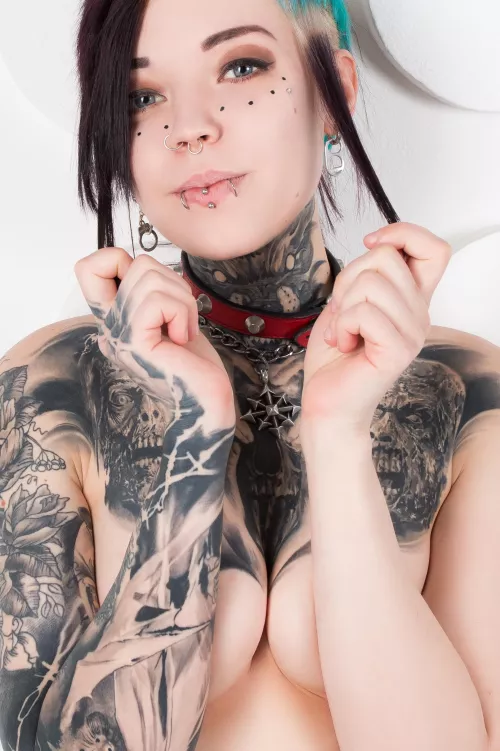 Want to know the meaning of those two zombies tatted? (OC)