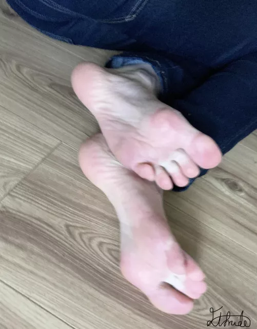 Crossed at the ankles