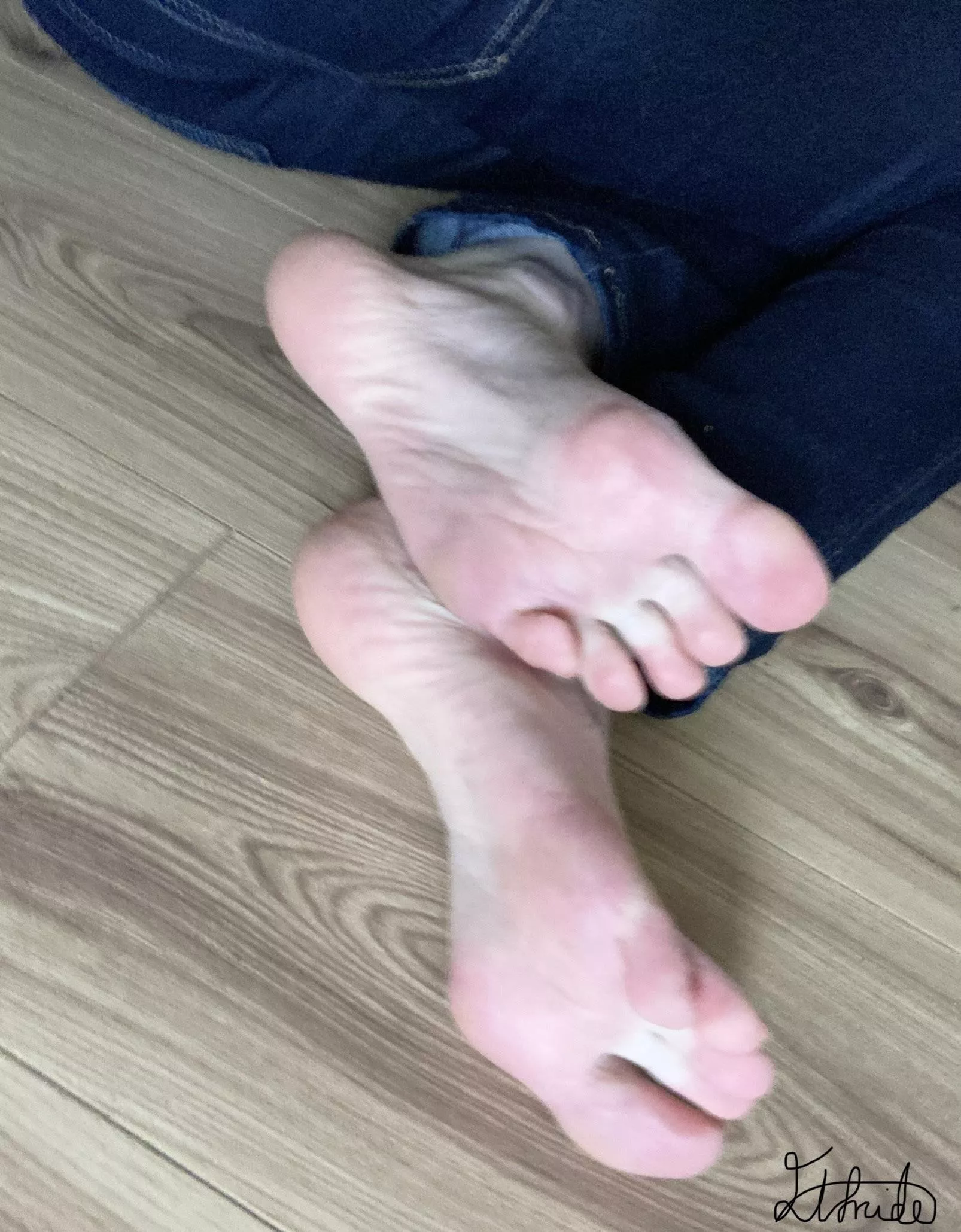 Crossed at the ankles